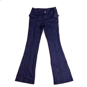 black flared low-rise pants w/ pockets and double buttons